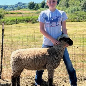 Jordyn with her lamb, Goose