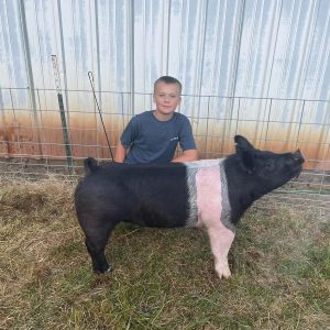 Luke with Peppa the hog