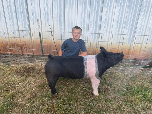 Luke with Peppa the hog